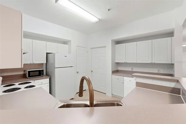 $379,000 | 231 Goldenrain Drive, Unit 101, Celebration, FL 34747