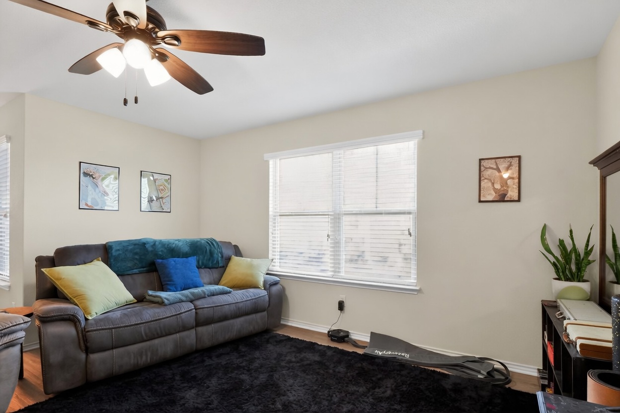 521 Staton Street Georgetown, TX 78626 - Photo 11 of 39 a living room with furniture and a window