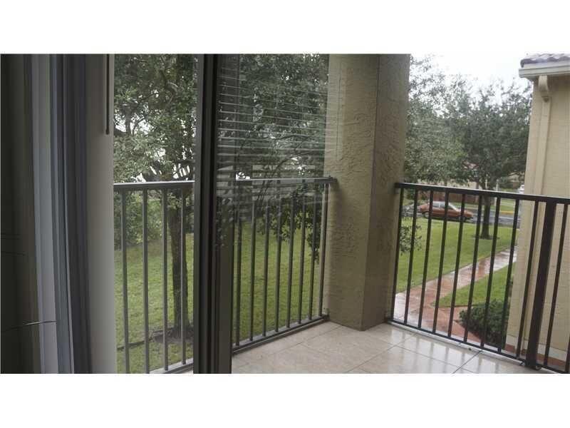 10312 Fox Trail Road South, Unit 1012 Royal Palm Beach, FL 33411 - Photo 6 of 6 a black and white photo of a living room