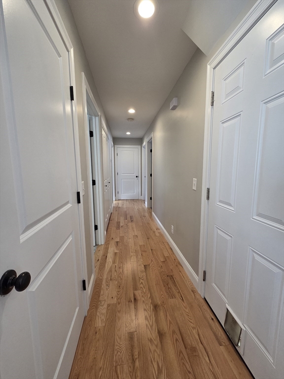 29 Lake Road Brookfield, MA 01506 - Photo 11 of 36 a view of a hallway with wooden floor and staircase
