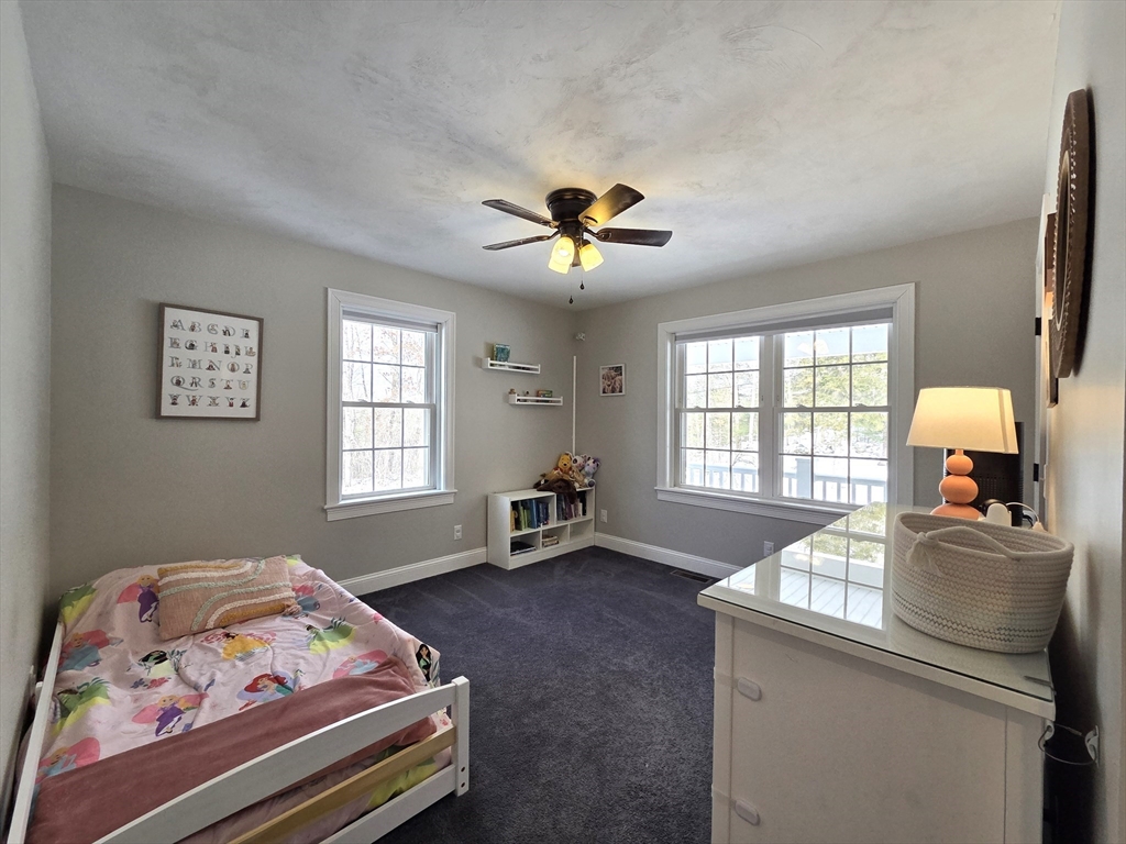 29 Lake Road Brookfield, MA 01506 - Photo 16 of 36 a bedroom with a bed and a window