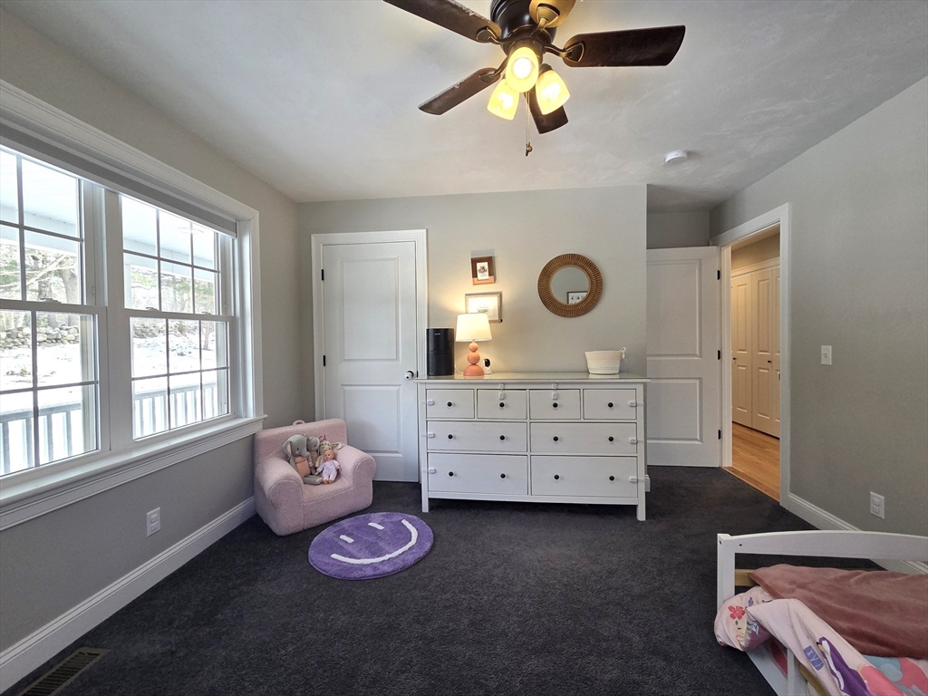 29 Lake Road Brookfield, MA 01506 - Photo 17 of 36 a bedroom with a bed and a dresser