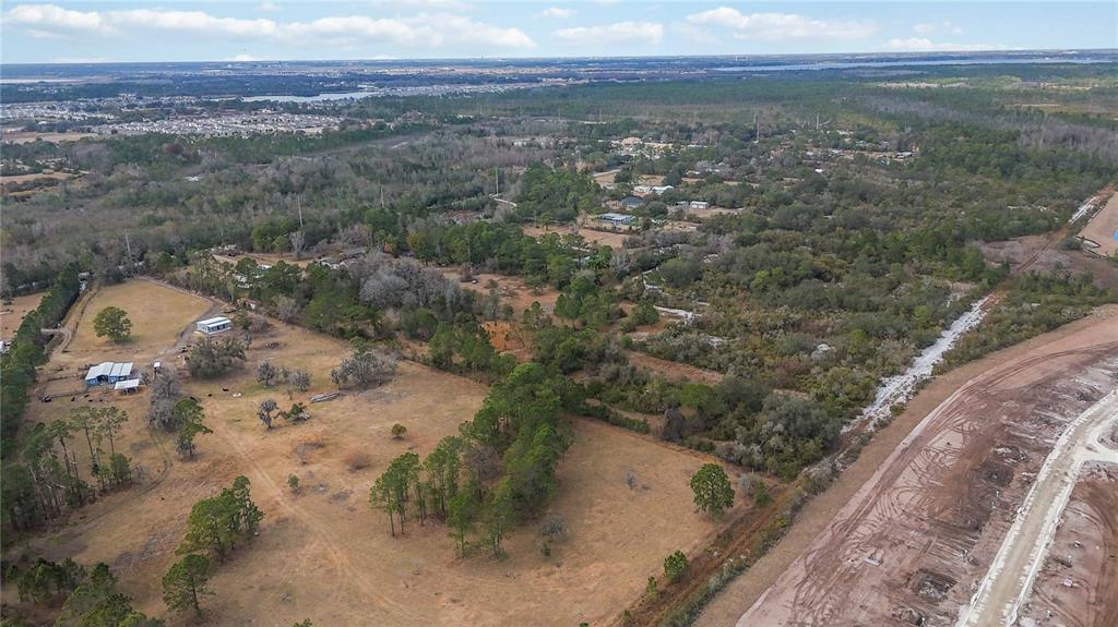 2665 Absher Road St. Cloud, FL 34771 - Photo 7 of 27 a view of a yard with a mountain