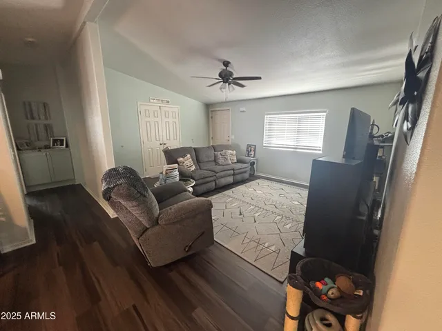 a living room with furniture and a window