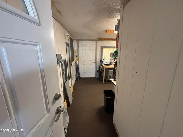 a view of hallway with stairs