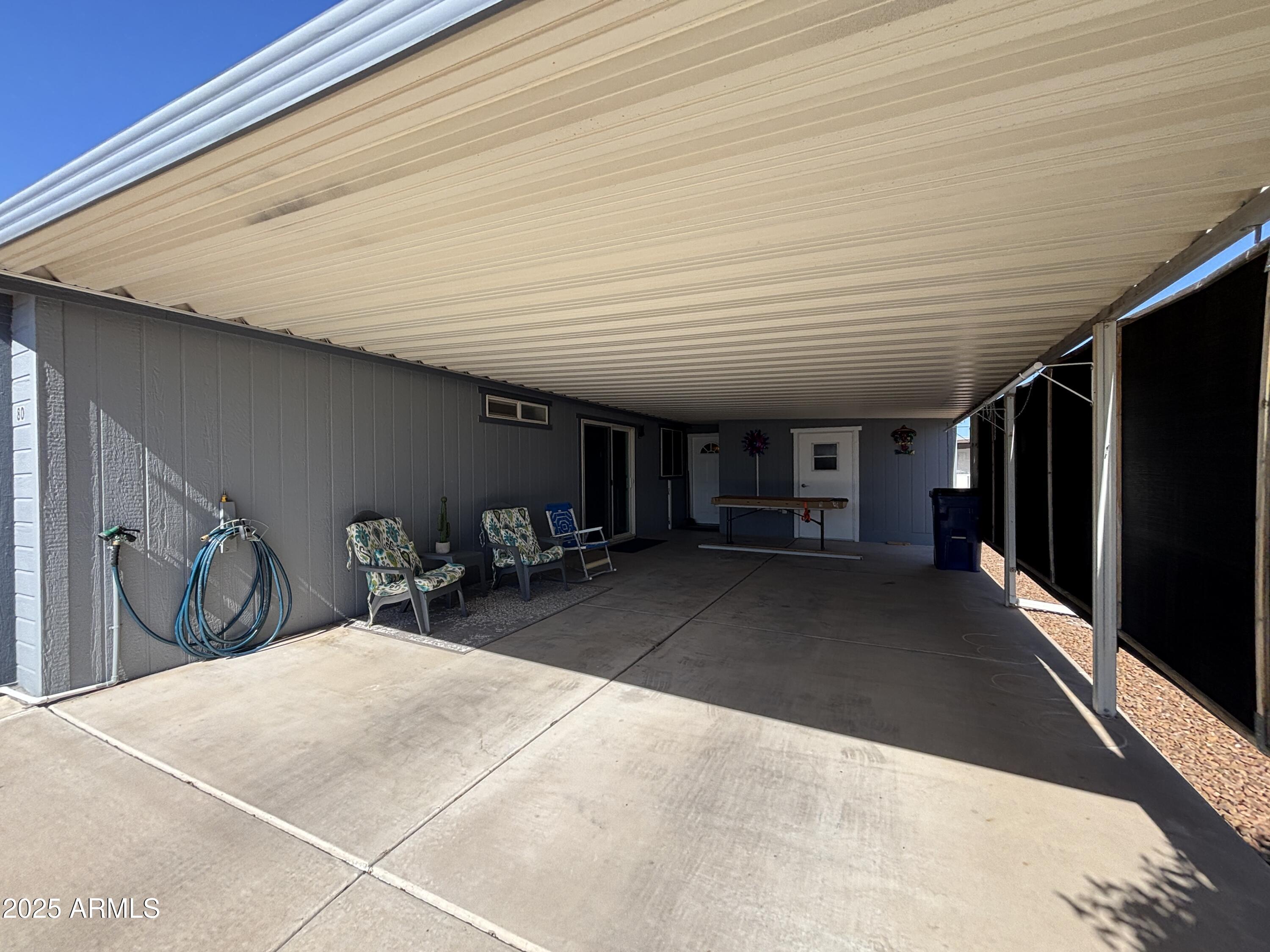 2400 East Baseline Avenue, Unit 80 Apache Junction, AZ 85119 - Photo 4 of 33 a view of a patio