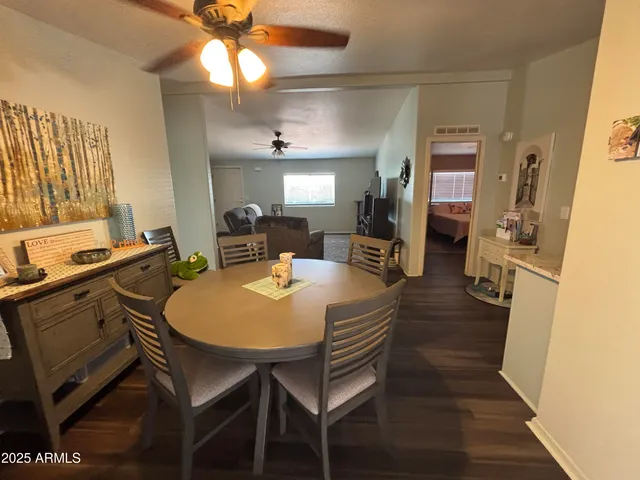 a view of a dining room with furniture