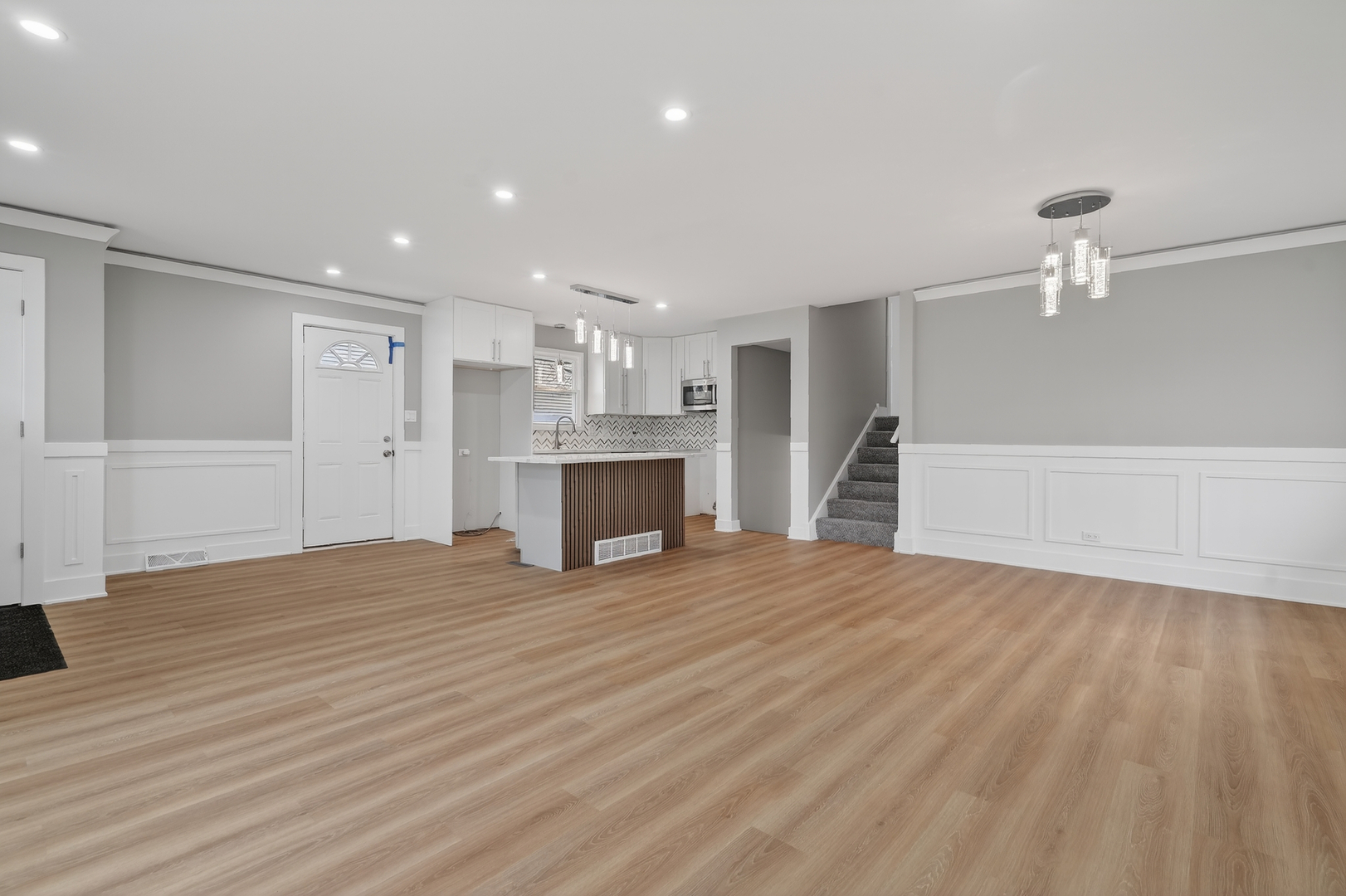 515 West 146th Street Dolton, IL 60419 - Photo 18 of 47 a view of empty room with wooden floor and fireplace