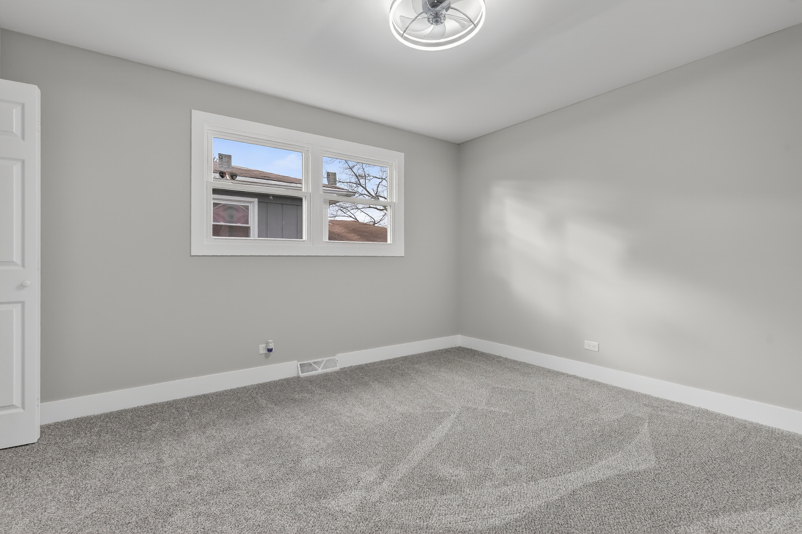 515 West 146th Street Dolton, IL 60419 - Photo 24 of 47 a view of an empty room with a window