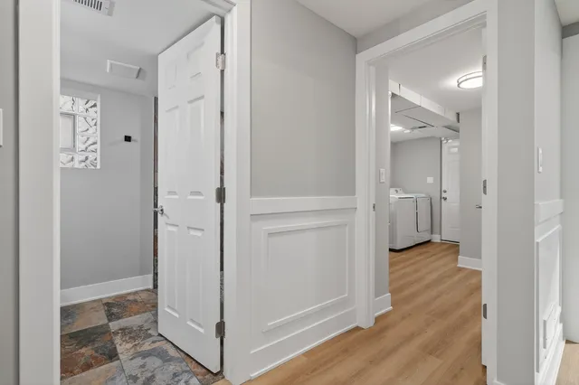 a view of an empty room with a window