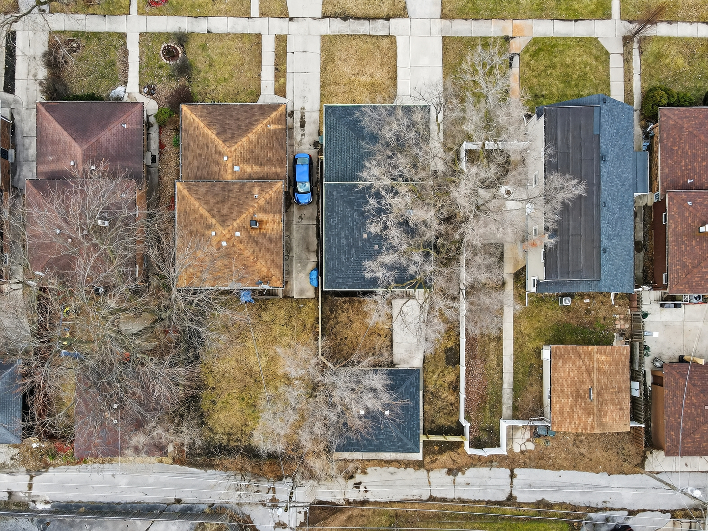 515 West 146th Street Dolton, IL 60419 - Photo 44 of 47 front view of a brick house next to a yard