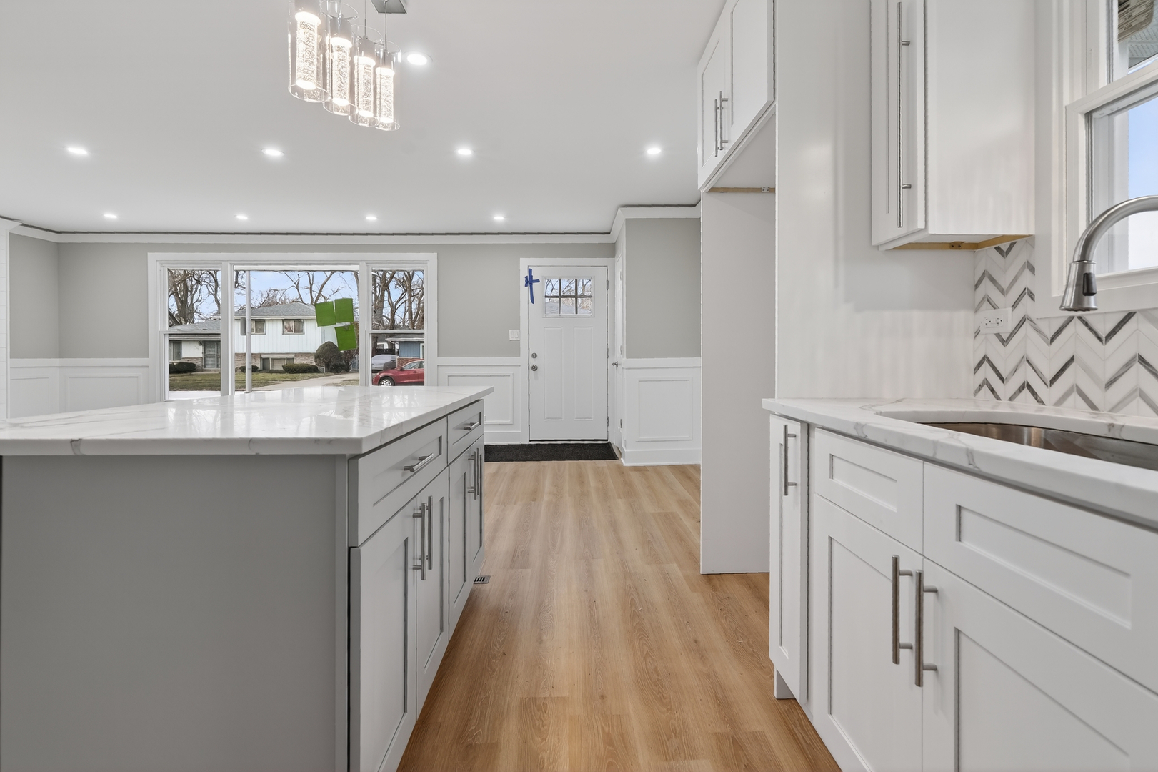 515 West 146th Street Dolton, IL 60419 - Photo 6 of 47 a kitchen with a sink stove and cabinets