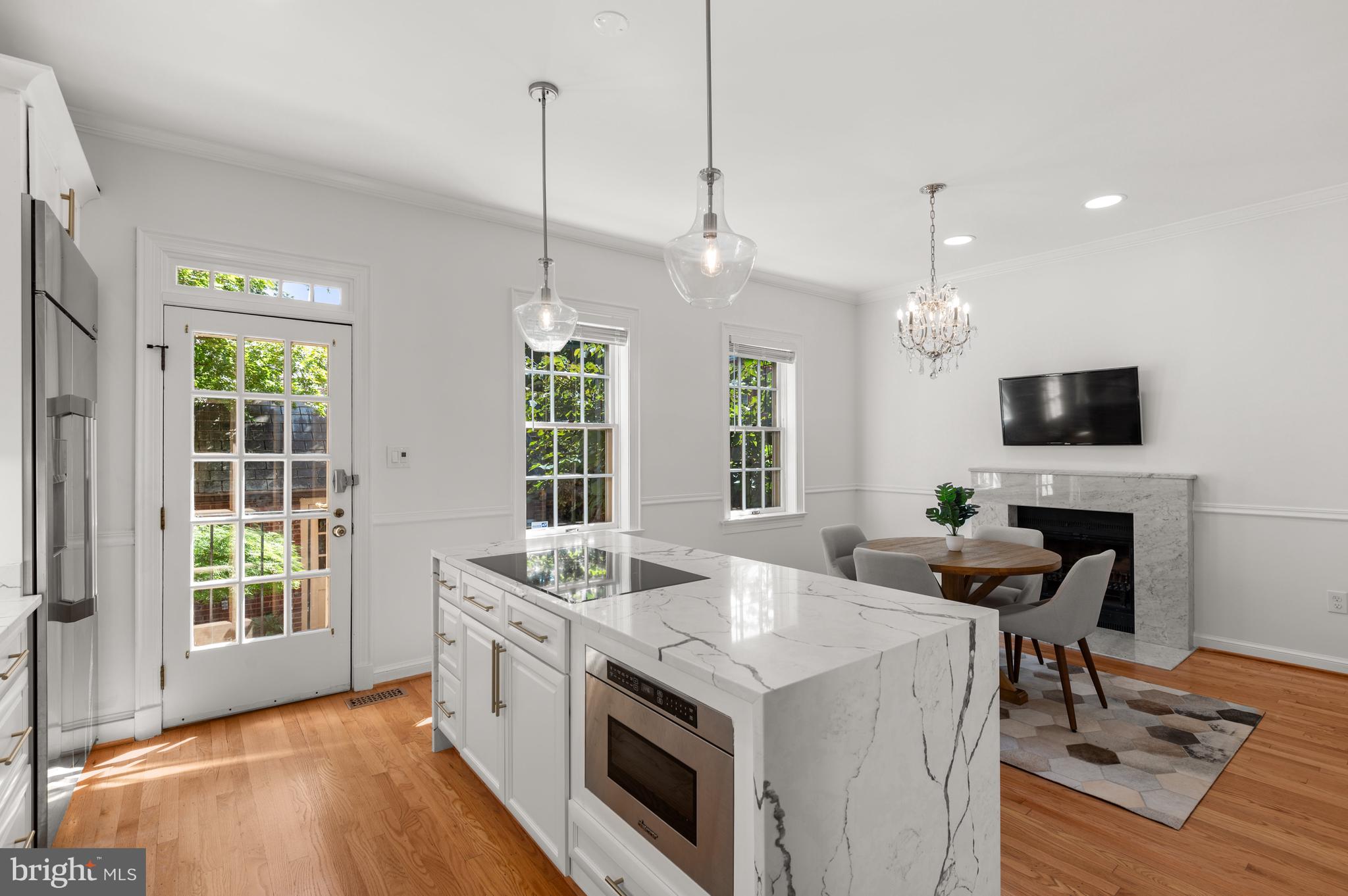3525 Winfield Lane Northwest Washington, DC 20007 - Photo 6 of 32 Kitchen with Dining Area & Fireplace