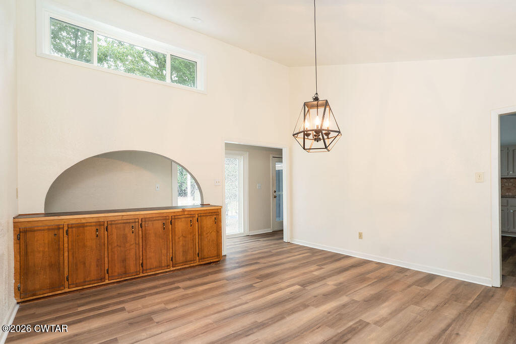 7 Timberlake Drive Jackson, TN 38305 - Photo 4 of 38 a view of a room with wooden floor