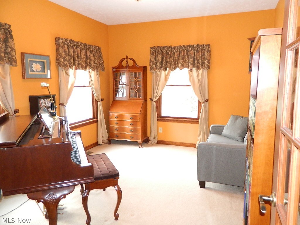 12395 Falcon Ridge Road Chesterland, OH 44026 - Photo 5 of 35 Front Parlor with French Doors Used As A Music Room or Cozy Living Room