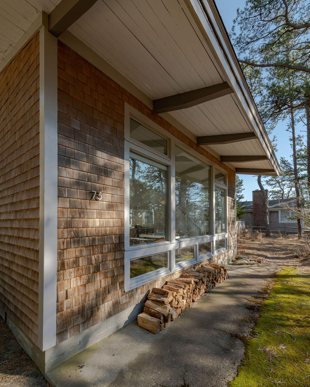 73 King Phillip Road Wellfleet, MA 02667 - Photo 28 of 35 a view of a patio with a table and chairs