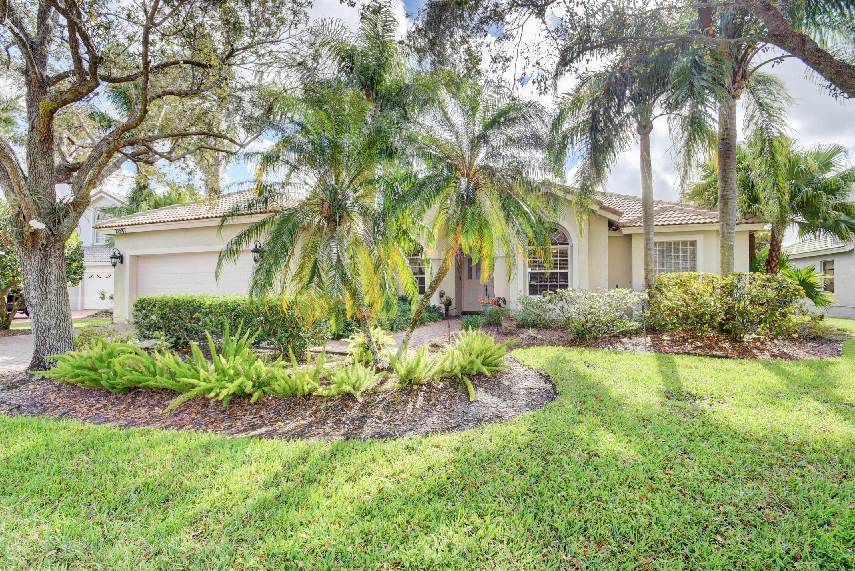 21587 Halstead Drive Boca Raton, FL 33428 - Photo 1 of 53 a front view of house with yard and green space