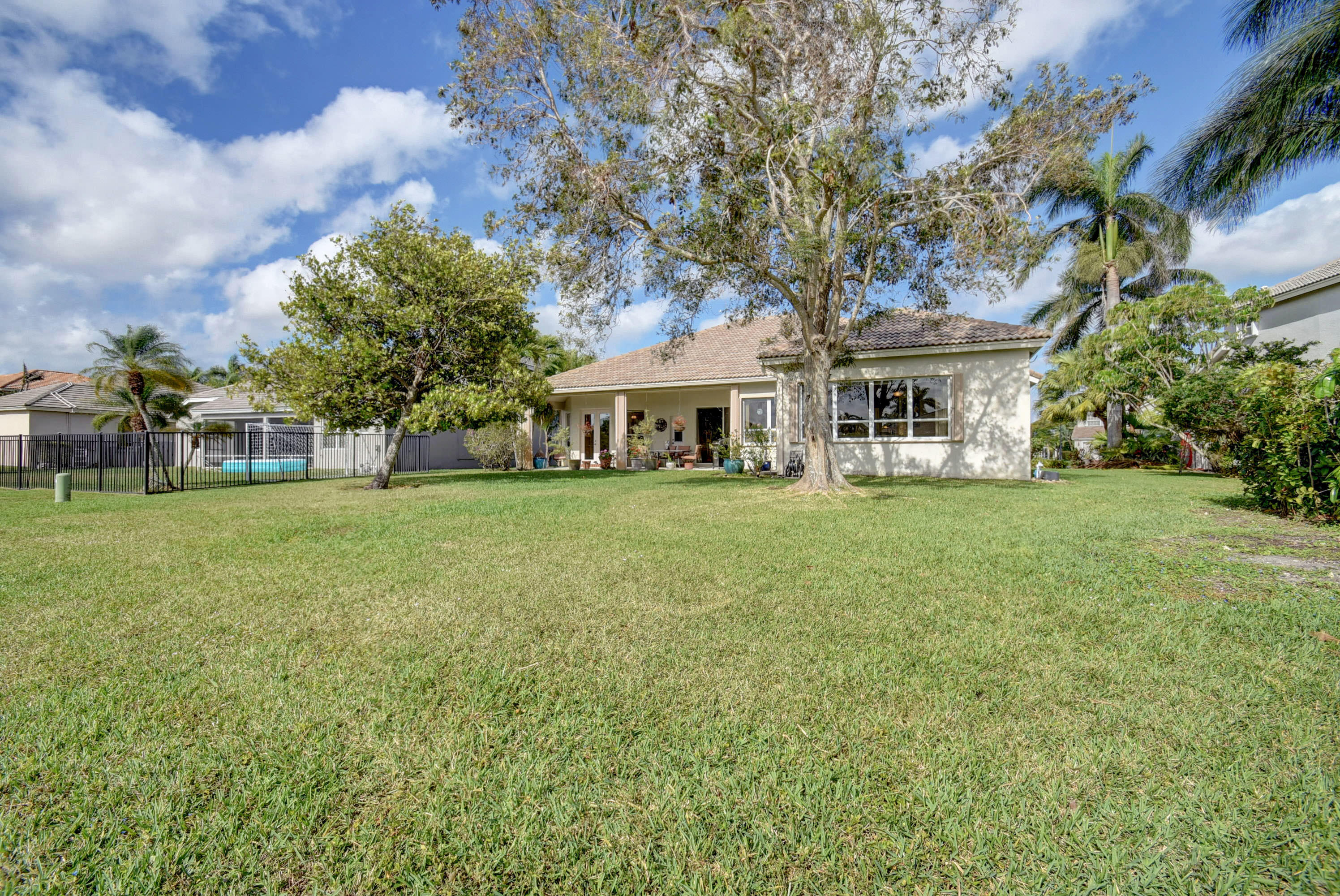 21587 Halstead Drive Boca Raton, FL 33428 - Photo 34 of 53 a front view of house with yard and green space