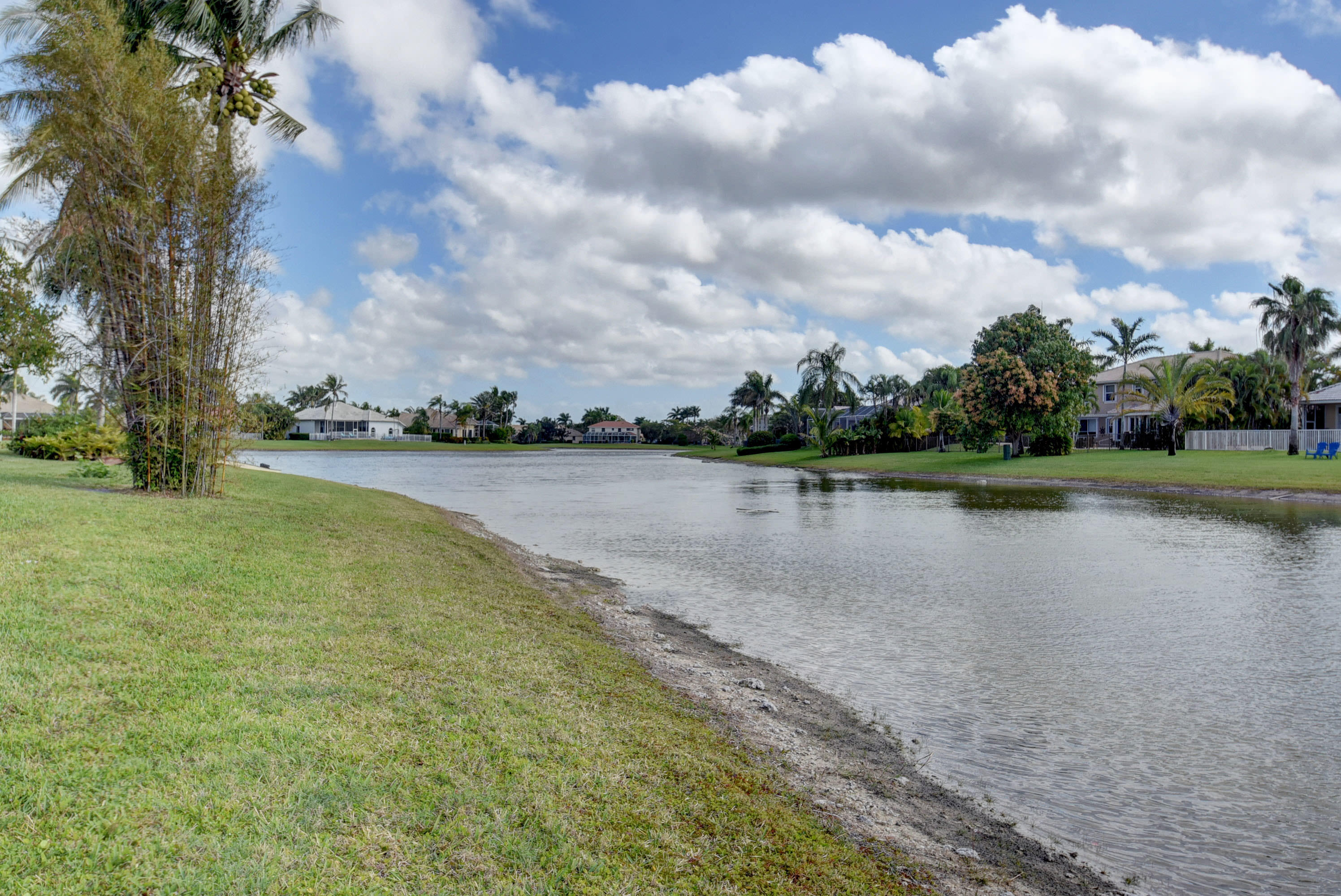 21587 Halstead Drive Boca Raton, FL 33428 - Photo 36 of 53 a view of a lake with houses in the back
