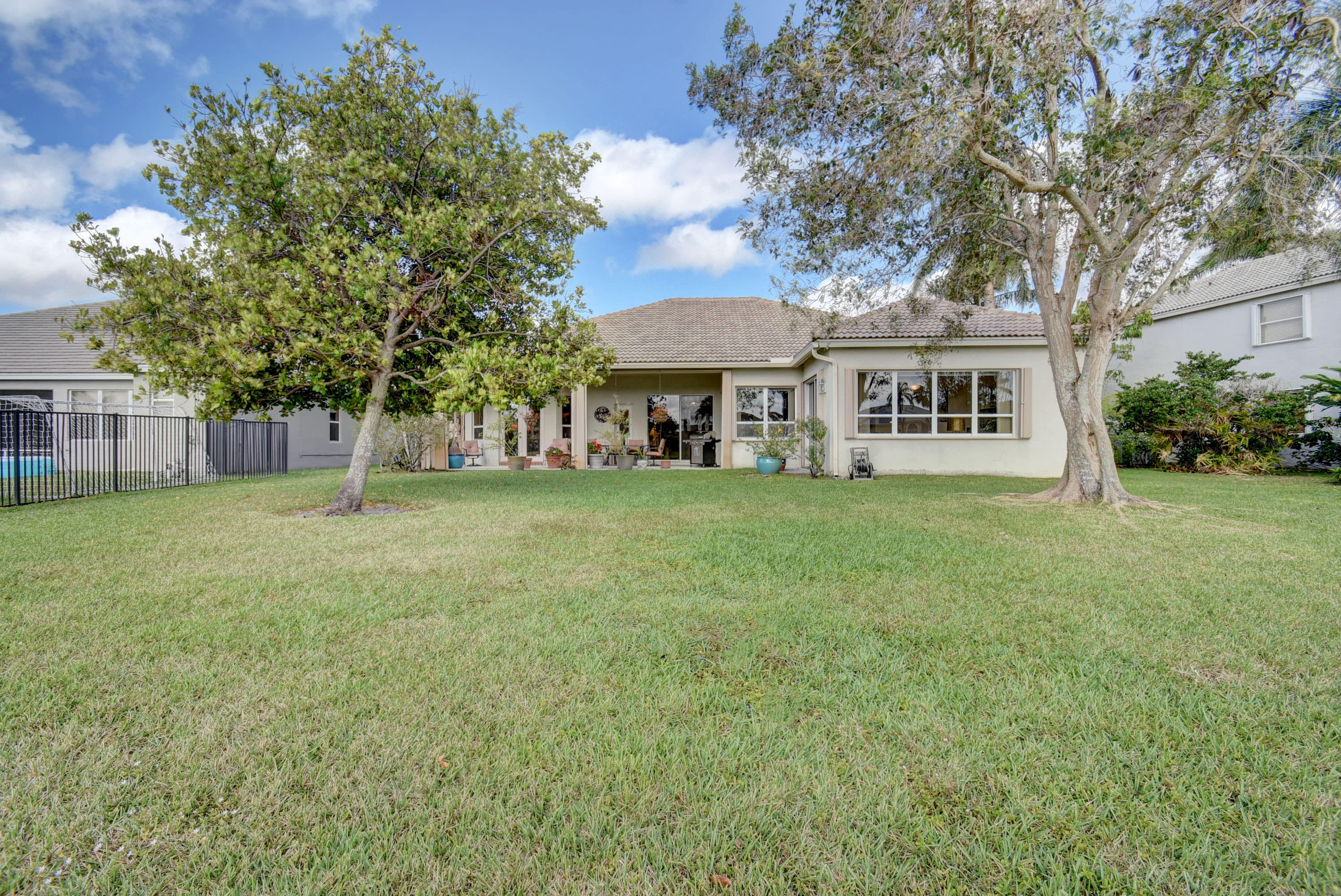 21587 Halstead Drive Boca Raton, FL 33428 - Photo 38 of 53 front view of a house with a yard