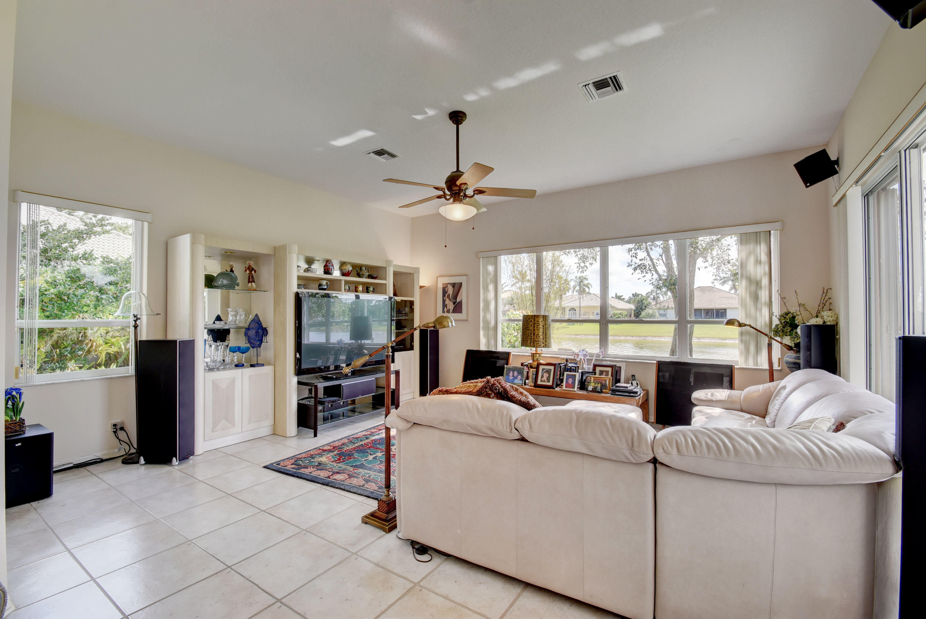 21587 Halstead Drive Boca Raton, FL 33428 - Photo 8 of 53 a living room with furniture large window and flat screen tv