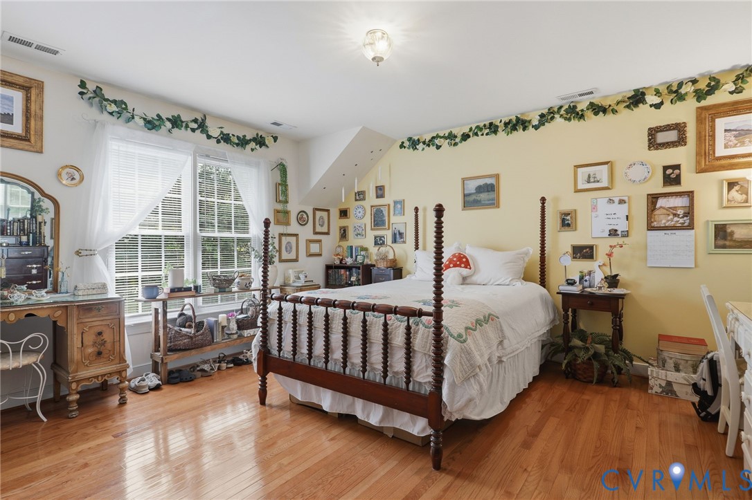 13424 Tipple Point Road Midlothian, VA 23114 - Photo 37 of 53 a bed room with a bed and a chair