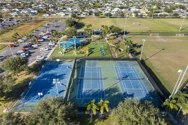 a view of a garden with a fountain