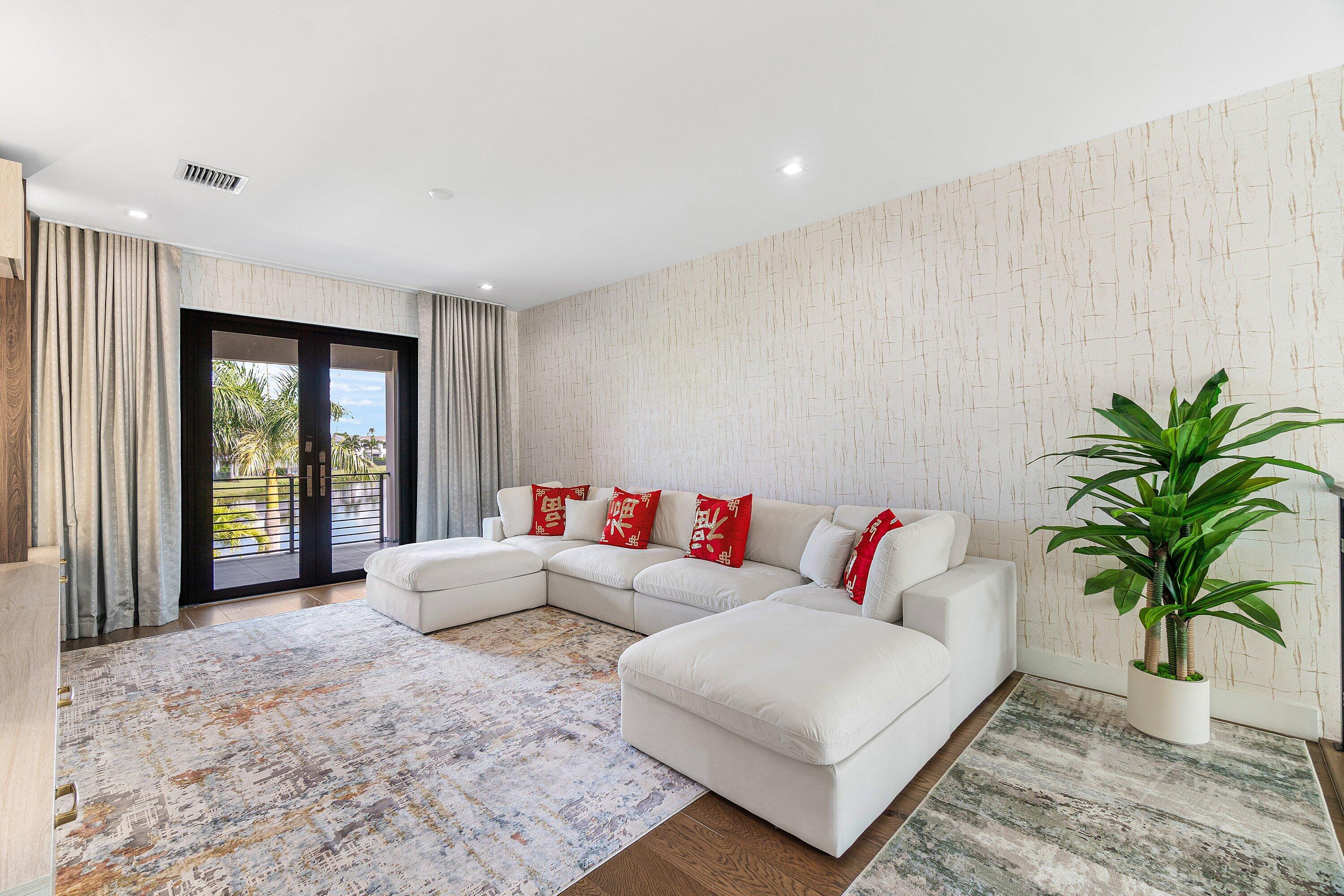 8233 Crystal Downs Avenue Boca Raton, FL 33434 - Photo 25 of 58 a living room with furniture and large windows