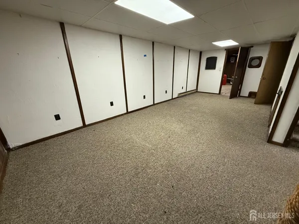 a view of a livingroom with an entryway
