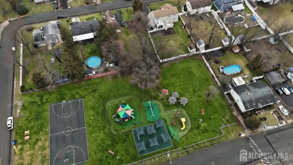 an aerial view of a house having yard
