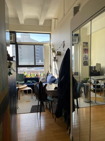 a view of a livingroom and dining room