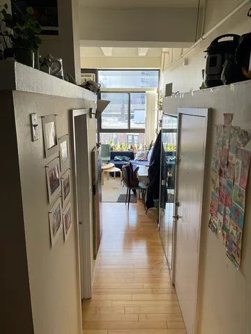 a room with lots of chairs and a projector screen