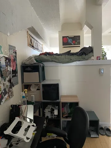 a bathroom with a sink toilet a mirror and shower