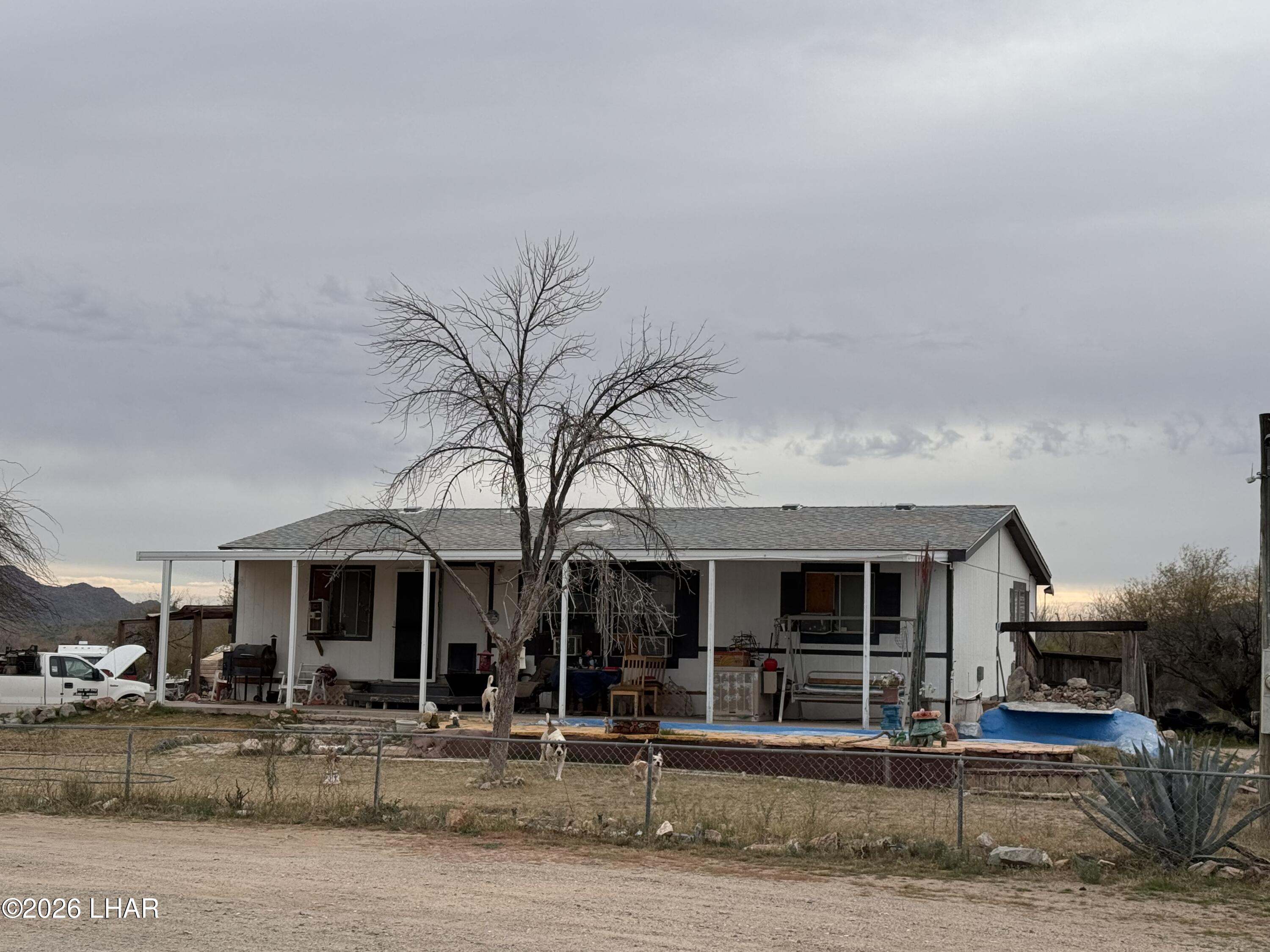 69896 Salome Road Salome, AZ 85348 - Photo 1 of 19 a front view of a building with street view