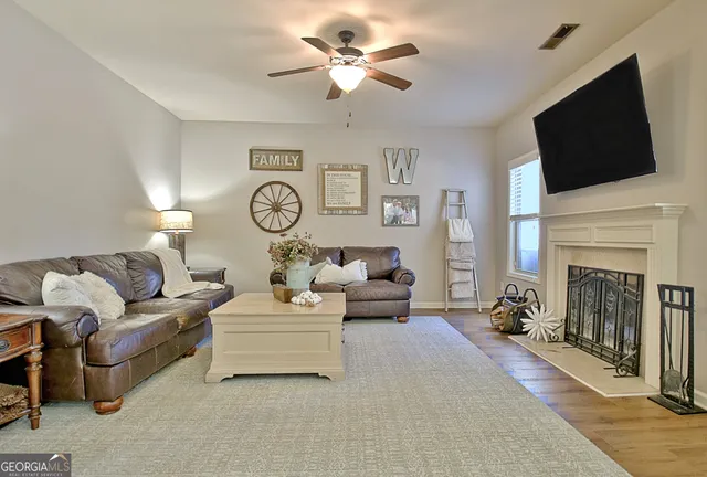 a living room with furniture and a window