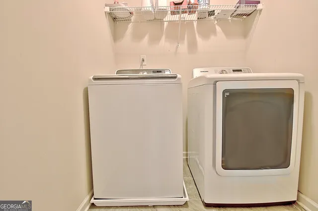 a front view of a house with swimming pool and outdoor seating