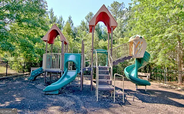 a view of a swimming pool with an outdoor space and seating area