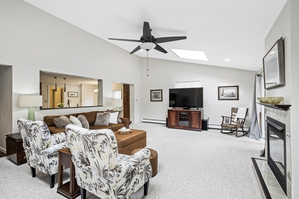 3 Laird Road Medford, MA 02155 - Photo 17 of 42 a living room with furniture and a flat screen tv