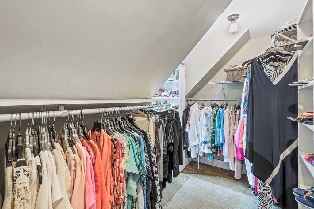 3 Laird Road Medford, MA 02155 - Photo 32 of 42 a view of walk in closet with clothes