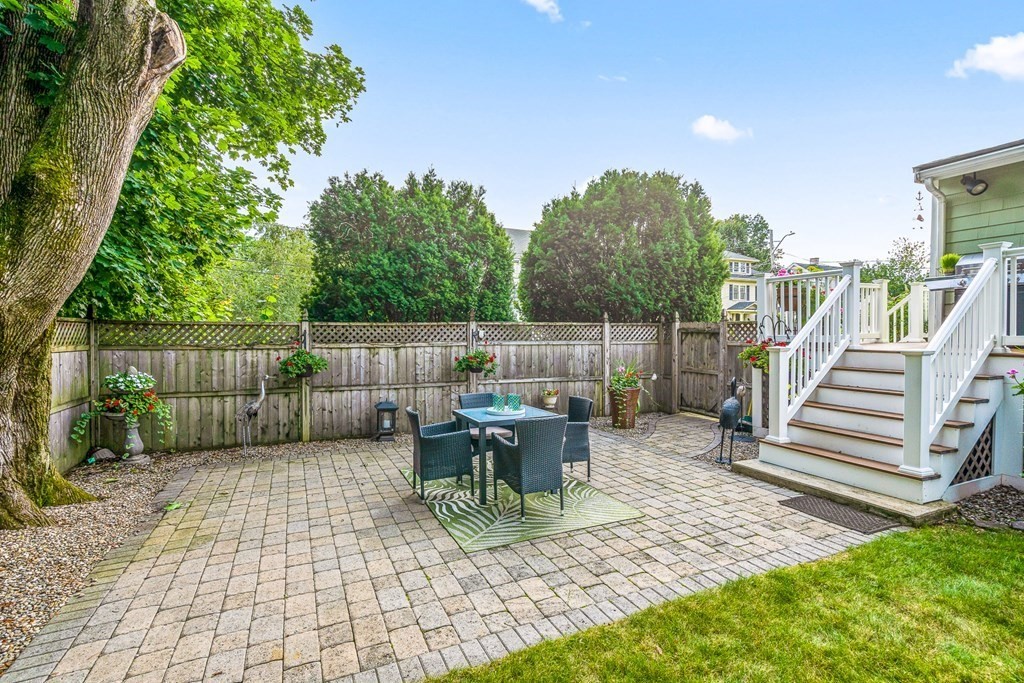 3 Laird Road Medford, MA 02155 - Photo 42 of 42 a view of a chair and tables in the patio