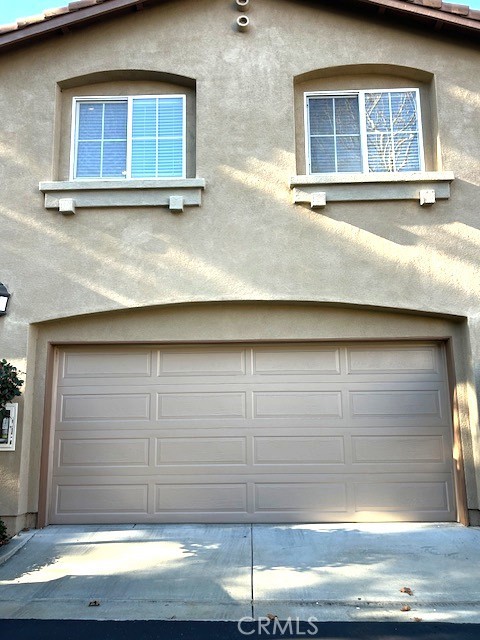 23 Cameron, Unit 67 Irvine, CA 92602 - Photo 2 of 15 a view of a house with a door and wooden floor
