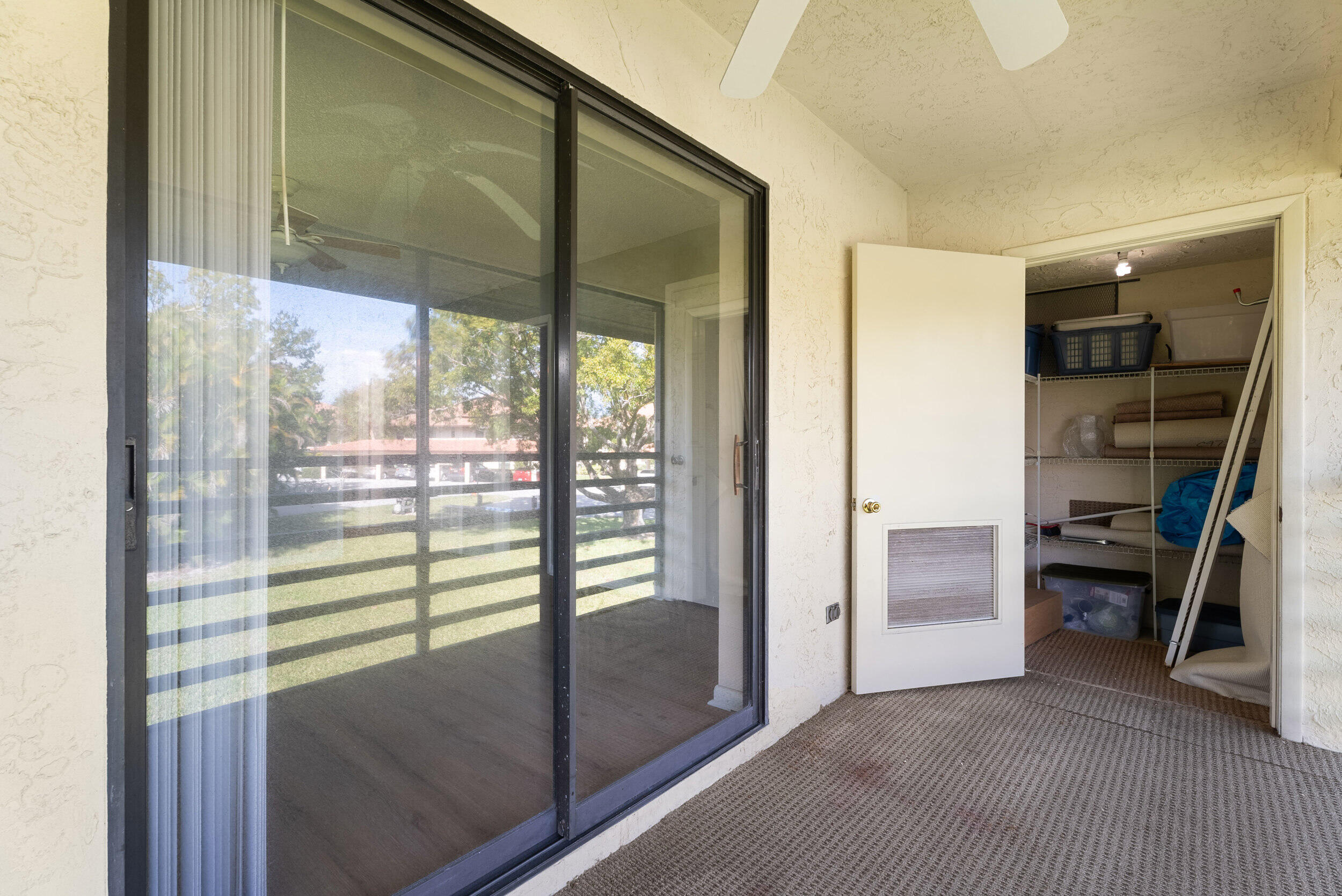 151 Southwest South River Drive, Unit 203 Stuart, FL 34997 - Photo 23 of 54 a view of hallway with furniture and balcony
