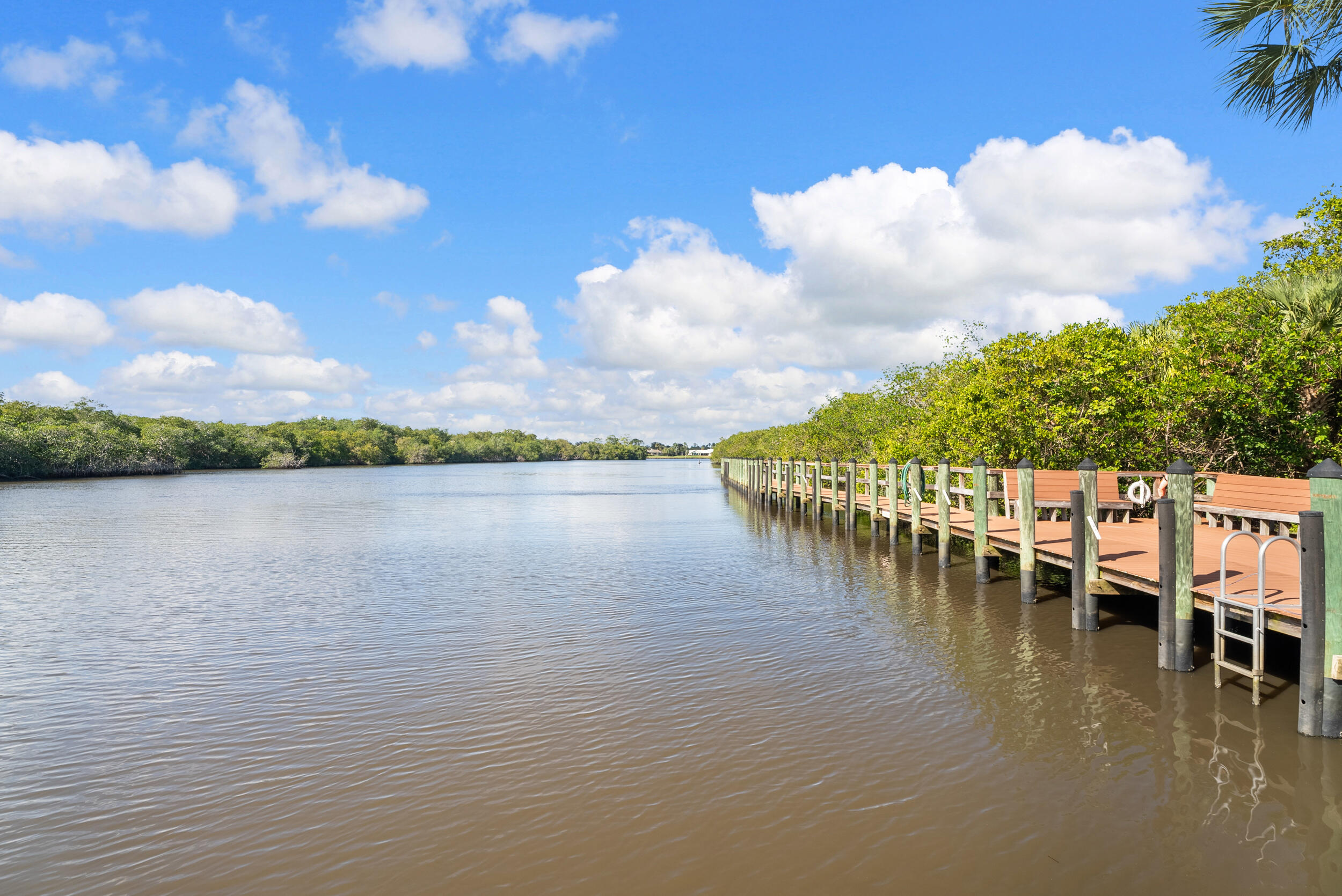 151 Southwest South River Drive, Unit 203 Stuart, FL 34997 - Photo 25 of 54 a view of a lake with outdoor space