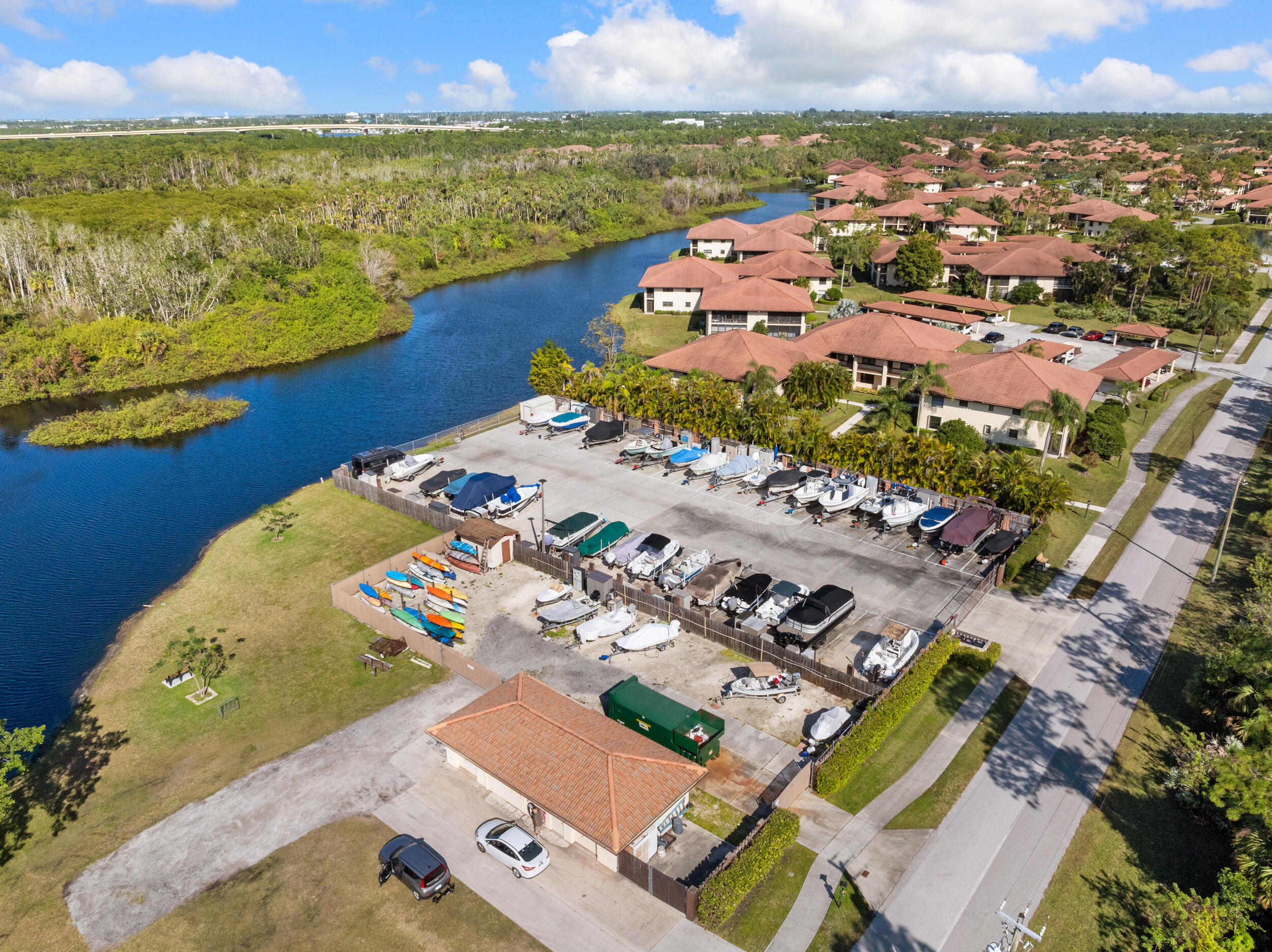 151 Southwest South River Drive, Unit 203 Stuart, FL 34997 - Photo 28 of 54 an aerial view of ocean and residential houses with outdoor space