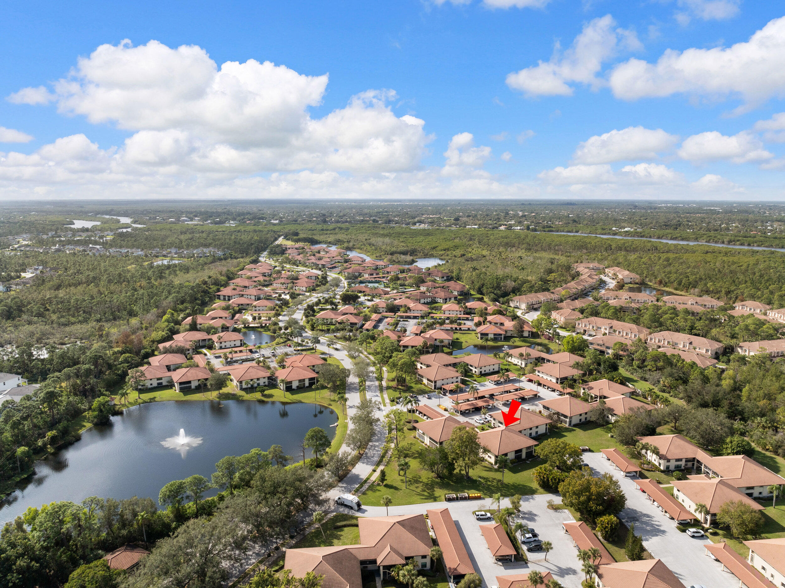 151 Southwest South River Drive, Unit 203 Stuart, FL 34997 - Photo 3 of 54 an aerial view of a city