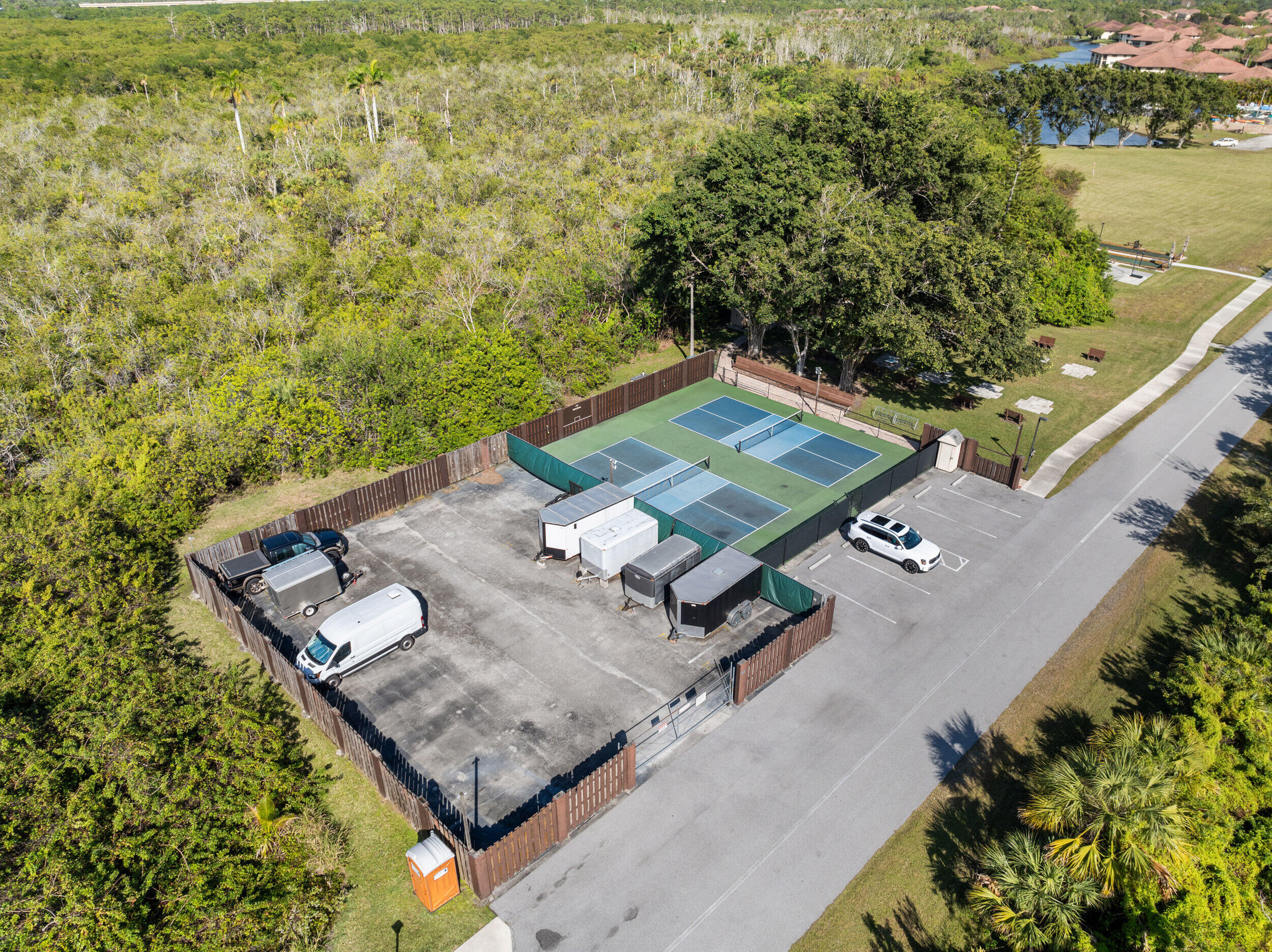 151 Southwest South River Drive, Unit 203 Stuart, FL 34997 - Photo 31 of 54 an aerial view of a pool with a yard