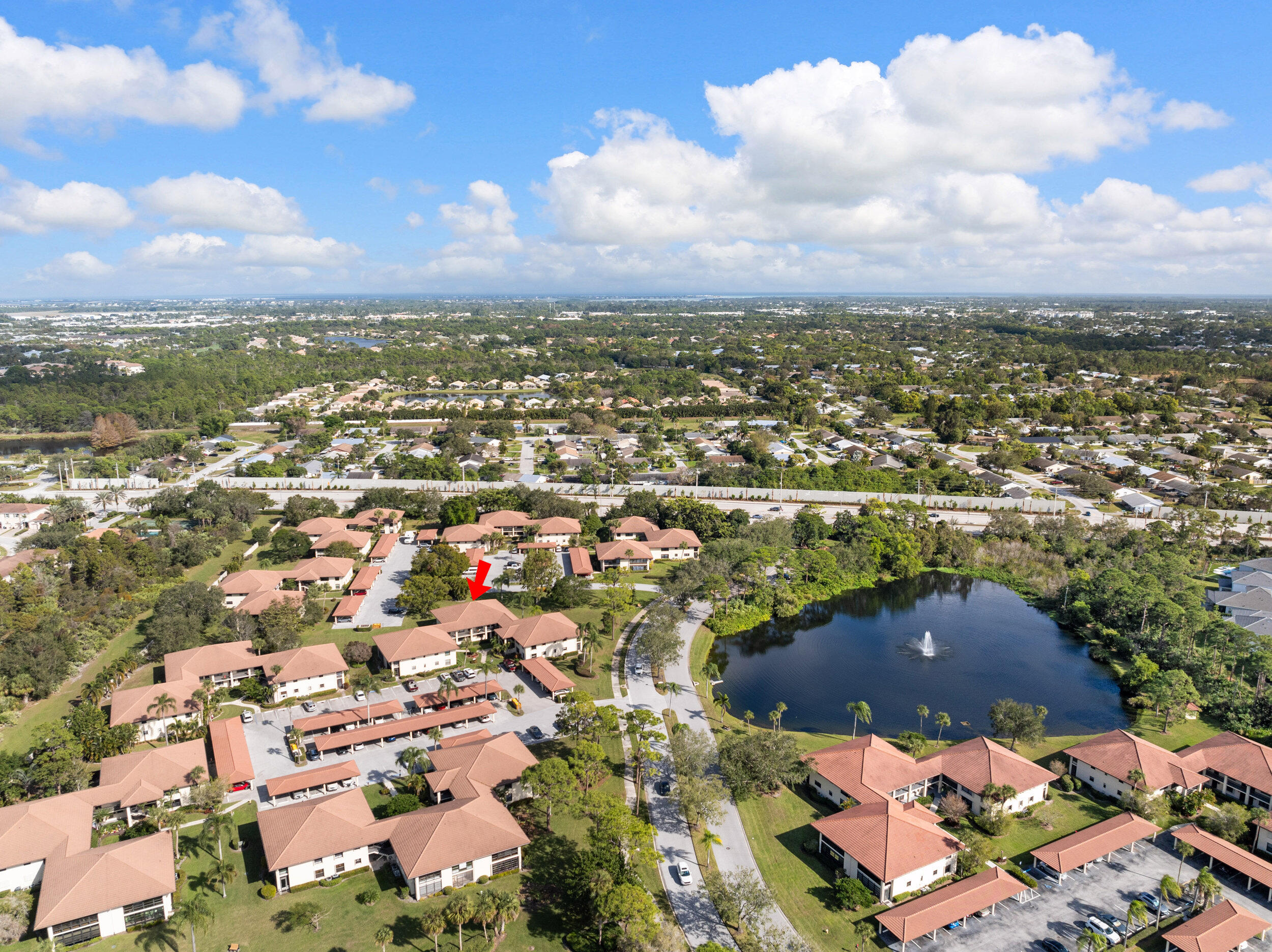 151 Southwest South River Drive, Unit 203 Stuart, FL 34997 - Photo 34 of 54 an aerial view of residential houses with outdoor space