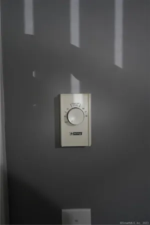 a bathroom with a toilet and a sink