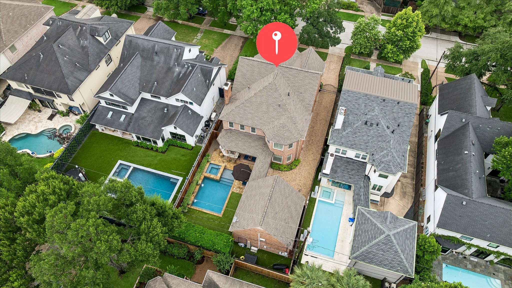 6358 Auden Street Houston, TX 77005 - Photo 48 of 50 an aerial view of residential house with outdoor space and parking