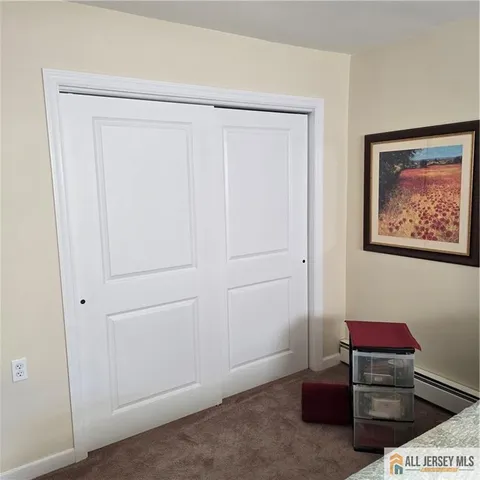 a view of a livingroom with furniture